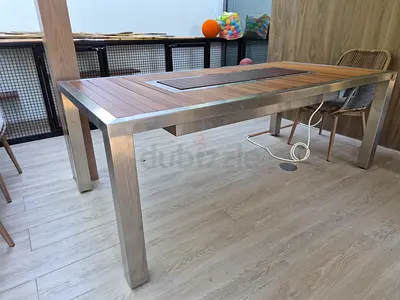 Selling korean table, bbq build in, 8 seater, 5kw power. 10000 Aed negotiable. In great condition
