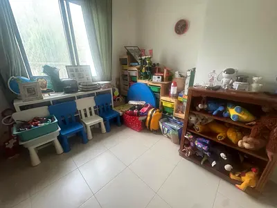 Kids playroom set with storage shelves, activity toys and small chairs