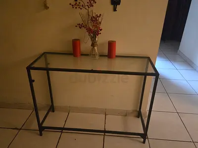 Slim black metal and glass console table - good condition