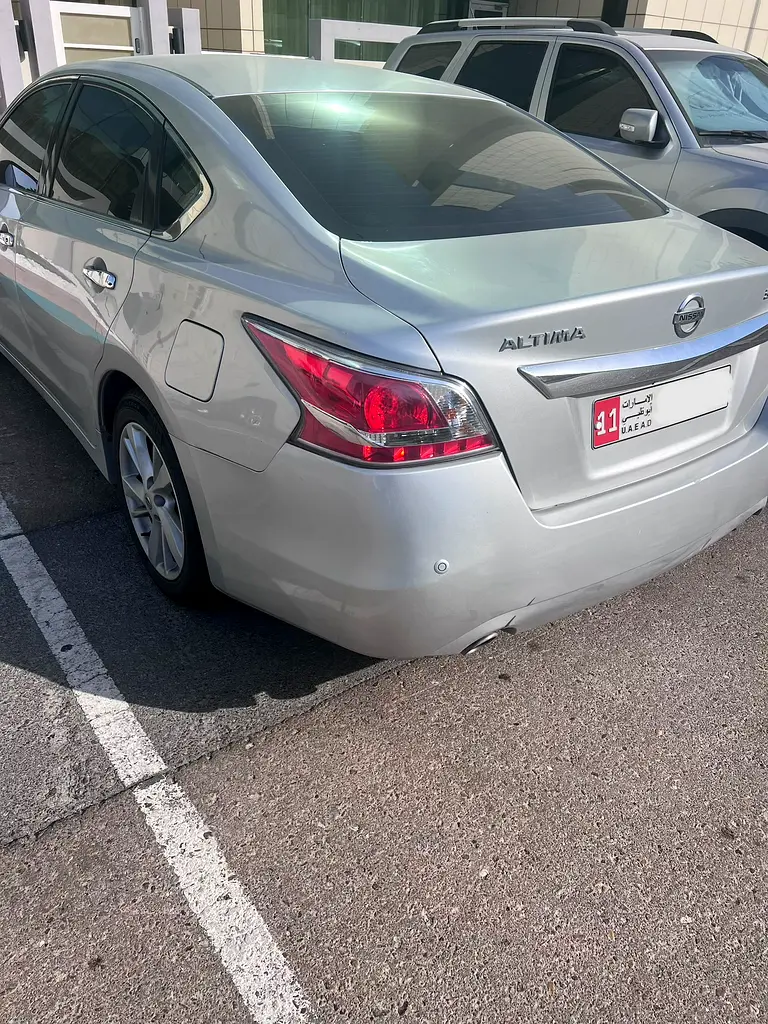 Nissan Altima 2015 — photo 1 of 9