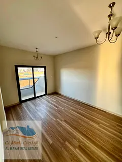 Two bedrooms, a living room, two bathrooms, and a balcony in Al Jurf 3. First occupancy, family buil