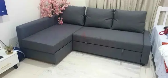 Ikea L Shape Sofa cum bed with big storage in L