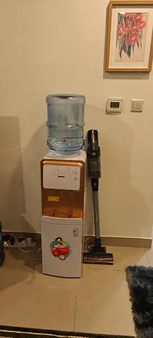 Used water cooler dispenser (top-load) in good working condition