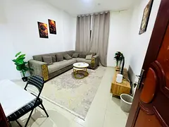 Furnished one-bedroom apartment for monthly rent in Al Khan, Sharjah, with two bathrooms. Clean and