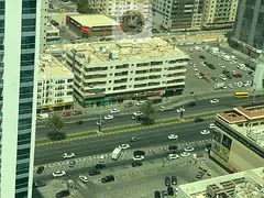 largest one bedroom apartment in al majaz 3 for annual rent with balcony and open city view master b