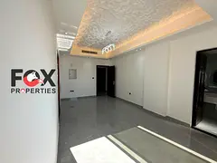 Luxury annual rental apartment in Al Alia, Ajman. 3 bedrooms, hall, 3 bathrooms, balcony, brand-new
