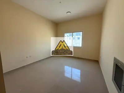 Studio apartment for annual rent | Al Aaliyah | Good size | In the heart of all services | Close to the Dubai and Sharjah exit