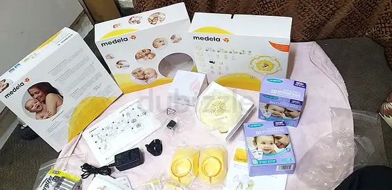 Medela Breast Pump Set with Accessories not used , incomplete Parts)