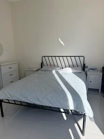 Bed, mattress and two bedside tables