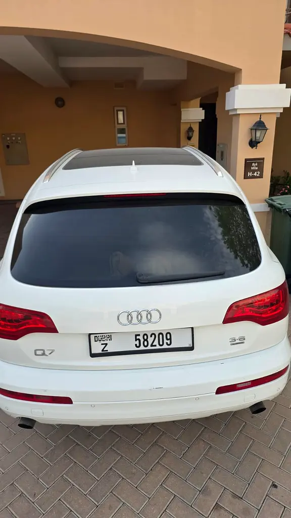 Audi Q7 2010 — photo 1 of 11