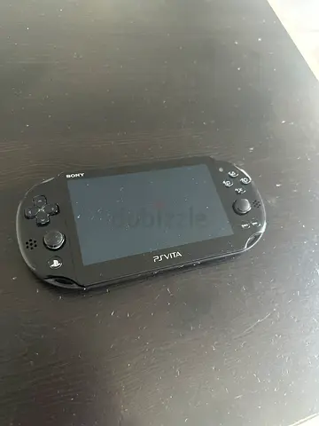 Sony PS Vita handheld console - drained battery (selling for parts)