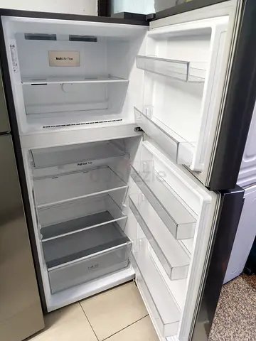 Used top-freezer refrigerator - clean interior, good condition