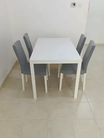 White Dining Table with 4 Grey Upholstered Chairs - Compact Set