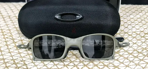 Oakley X Squared Metal Grey w/Black Iridium Polarized Lens.