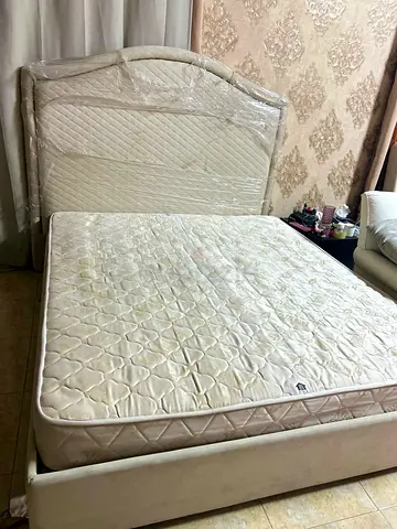 King bed frame with mattress and headboard - used, good condition