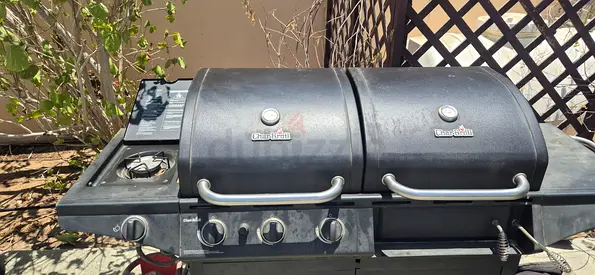 Char-Broil 4-burner gas grill with a side burner and cabinet base