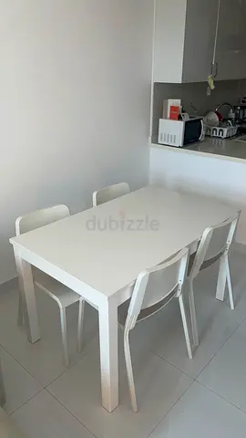 Dining Table + 4 Chairs – Good Condition