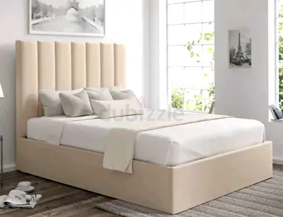 Beige Upholstered Bed with Vertical Fluted Headboard