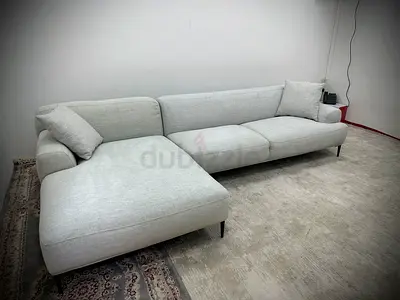 Like new condition the loom collection lshape sofa