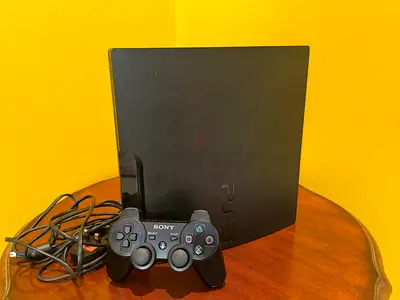 Sony PS3 Slim with DualShock 3 Controller - Good Working Condition