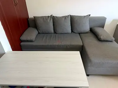 Grey L-shaped Sofa with Cushions
