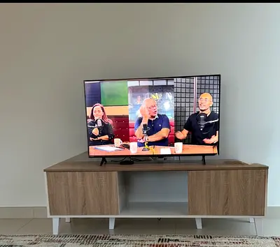 4.3-inch LED Smart TV - Good Condition with stand table