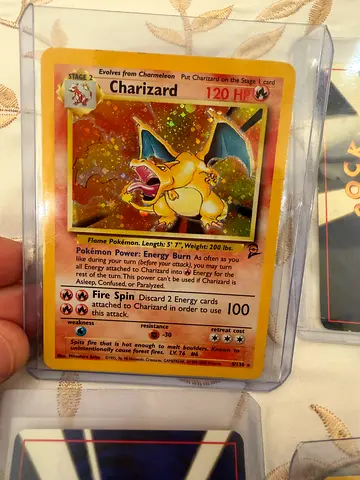 Holo Charizard Pokémon Card (in protective sleeve)