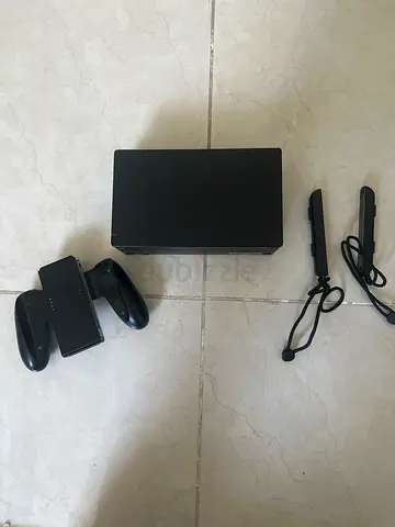 Nintendo Switch Dock Bundle with Joy‑Con Grip and Straps - Good Condition