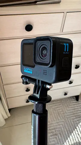 GoPro HERO11 Black action camera with short pole mount