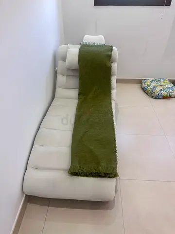 Modern White Tufted Chaise Lounge with Olive Green Throw Blanket