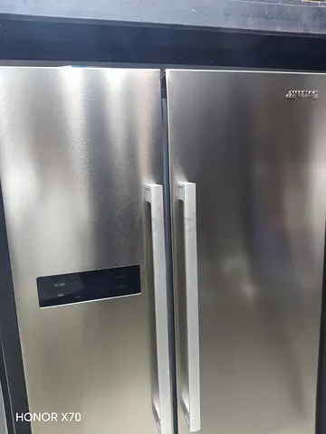 Used large silver double-door refrigerator - good working condition