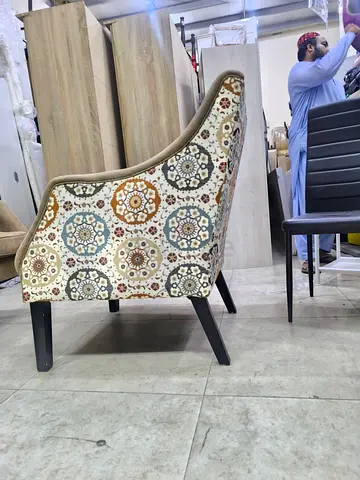Upholstered Accent Chair with Patterned Fabric and Wooden Legs