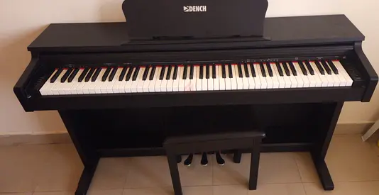 Dench digital piano with bench and pedals - good working condition