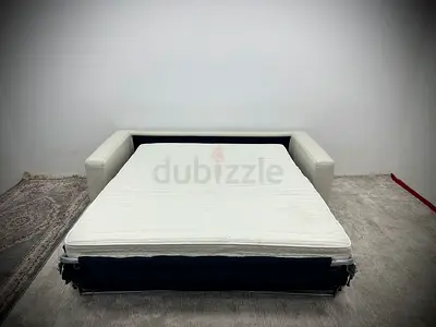 Like new condition Natuzzi sofa bed