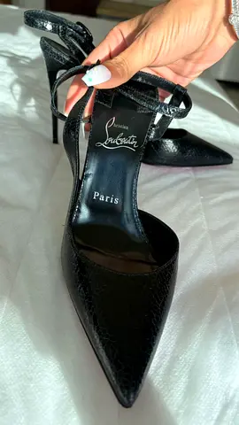 Christian Louboutin black pointed slingback heels - size not specified