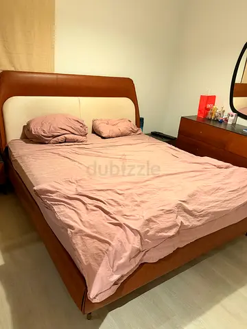King leather upholstered bed frame with matching night stand and dresser and mirror