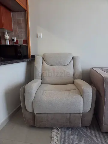 Light grey upholstered single armchair - good condition