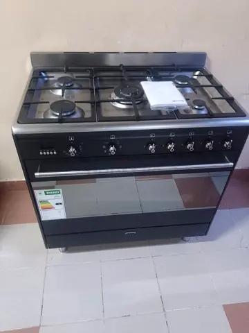 smeg brand Stainless Steel 5-Burner Gas Range with Oven - Good Condition