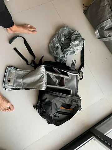 Lowerpro Camera Bag, with lens compartment, rain cover, sd card slot, laptop compartment