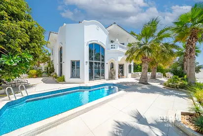 Exclusive Beachfront Villa with Skyline Views.