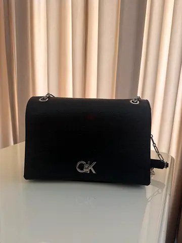 Black leather shoulder bag with silver chain strap (good condition)