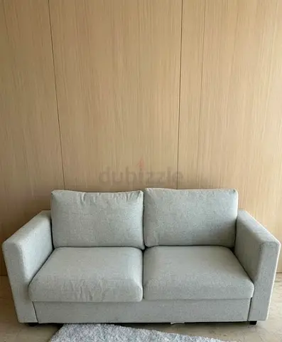Light grey 2-seater sofa-bed VIMLE in good condition
