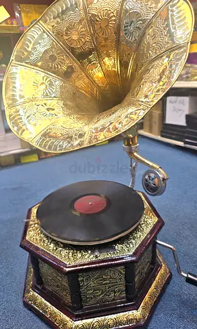 Beautiful brass 8 corner working gramophone with free cd record for sale.