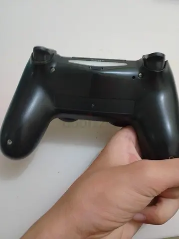 Ps4 controller  little scratches but still works fine still has grip on joystick no stick drift
