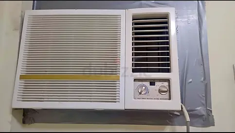 Used Window Air Conditioner - Functional, Needs Cleaning