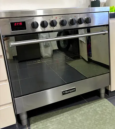 Bompani Stainless Steel Freestanding electri. Cooker with Oven - Good Condition