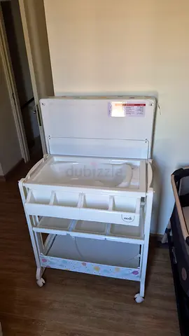 White Moon baby changing table with built-in bath and storage - good condition