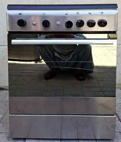 Ariston Gas cooker, with 4 burners, working perfect,  size 60x60cm