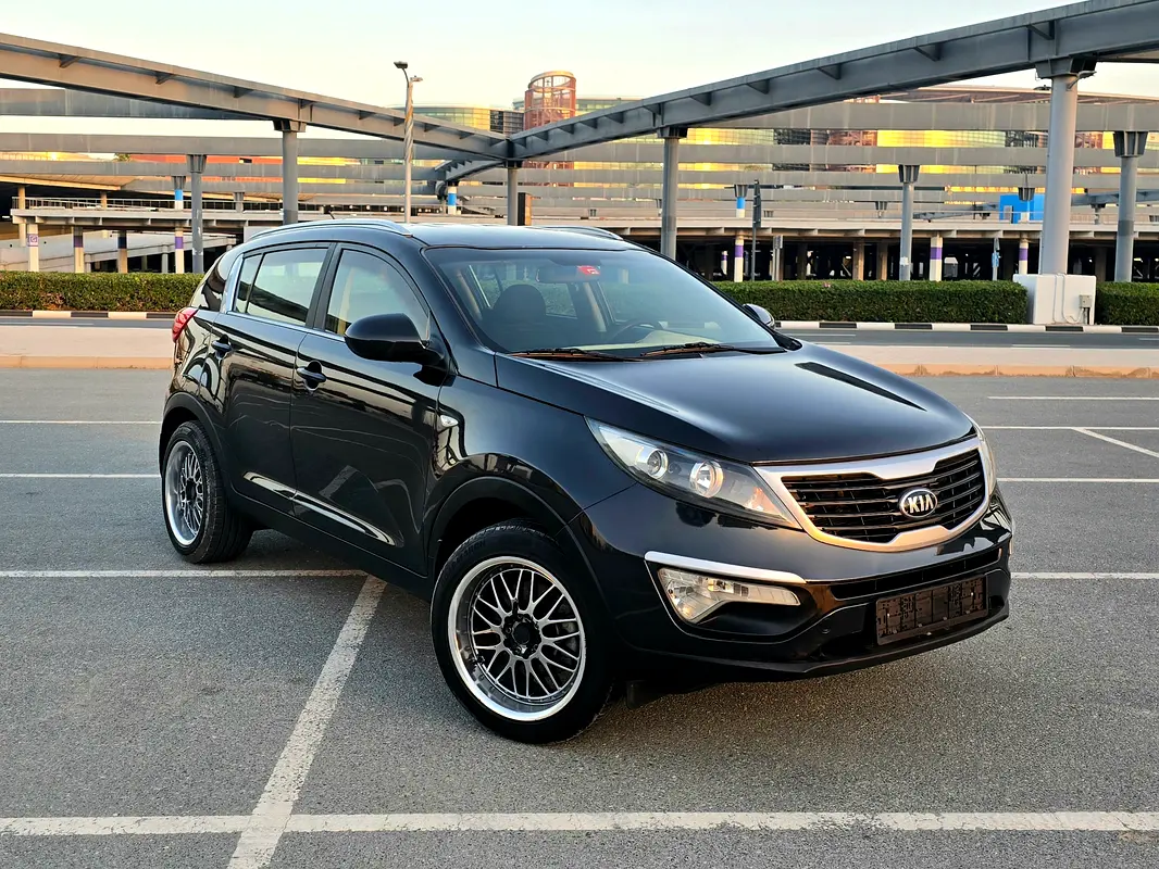 Kia Sportage 2014 — photo 1 of 18
