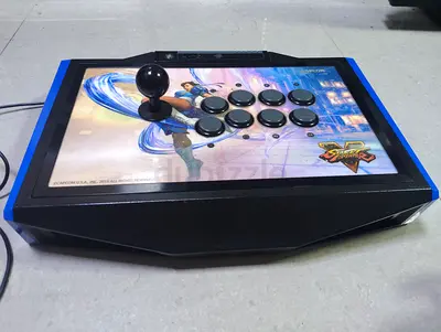Mad Catz Street Fighter V Arcade FightStick Tournament Edition designed for PlayStation 4.